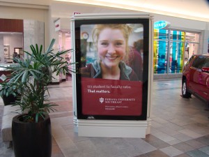 An advertisement for IU Southeast is displayed at Oxmoor Mall in Louisville. Jenny Johnson-Wolf, director of university communications, said the marketing has targeted both the Kentucky and Indiana sides of the Ohio River.