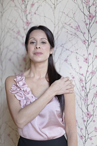 Erika Del Pilar Bouttier was diagnosed with breast cancer at 41. She had no family history of cancer, no abnormal lumps, and never a suspicious mammogram. Now, even years later, Bouttier bears the scars from her battle with cancer. Photo by Angela Anderson Photography