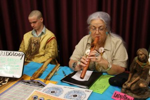 Photo courtesy. Lady Hawk practices a time of medicine which allows her to pinpoint health ailments by studying a person's eyes. 