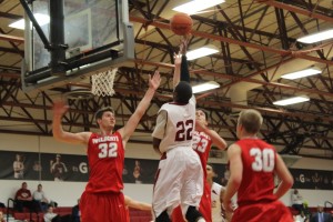 Senior guard Cameron Mitchell drives baseline for two of his game-high 26 points.