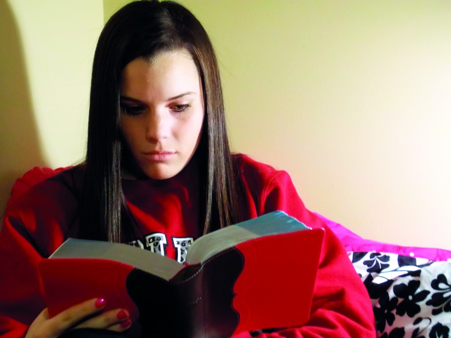 Roach spends time reading her Bible. She said this helps her stay strong. Photo by Melissa Spaide