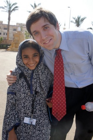 William White and one of his students outside the Dover American International School, Al Shorouk City, Cairo.