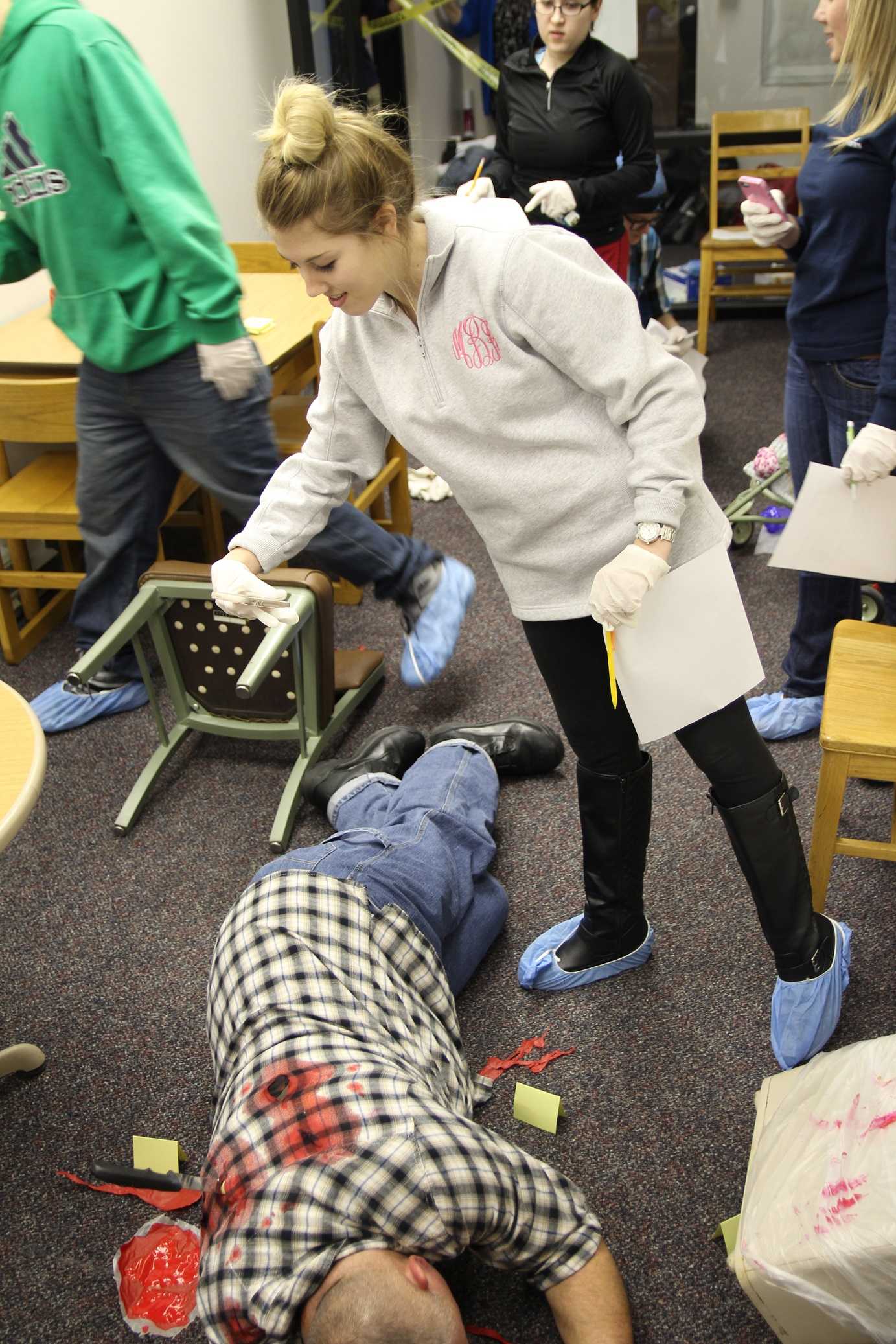Students+learn+from+mock+crime+scene+in+Crestview+Hall