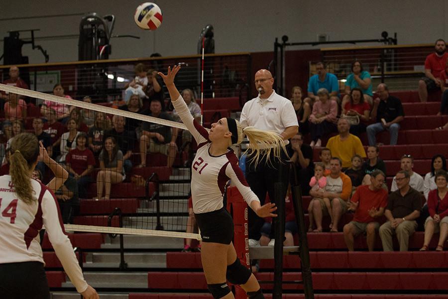 Hannah Joly, freshman outside hitter, goes up for the ball in the Grenadiers match against Point Park. Joly had a team-high 17 kills in the loss.