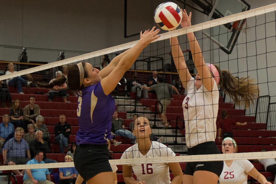 Maddie Jacobi, freshman defensive specialist, goes up for a block against a Cincinnati Christian player in the Grenadiers regular season game on Thursday, Nov. 5.  Jacobi tied for a team-high 11 kills in the loss.