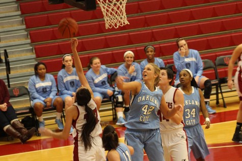 Senior forward Mary Dye and junior Jocelyn Mousty attempt to rebound the ball after a Mighty Oaks miss. The Grenadiers would go on to lose by 13.