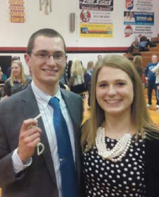 Hayden Casey and Carson Casey after Hayden’s high school team he helps coach won a sectional title. Photo courtesy of Hayden and Carson Casey