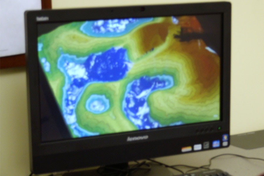 An augmented reality sandbox is shown at the Maker Club monthly meeting. 3-D topographical maps can be made in the sandbox by using a Kinect sensor and a projector.