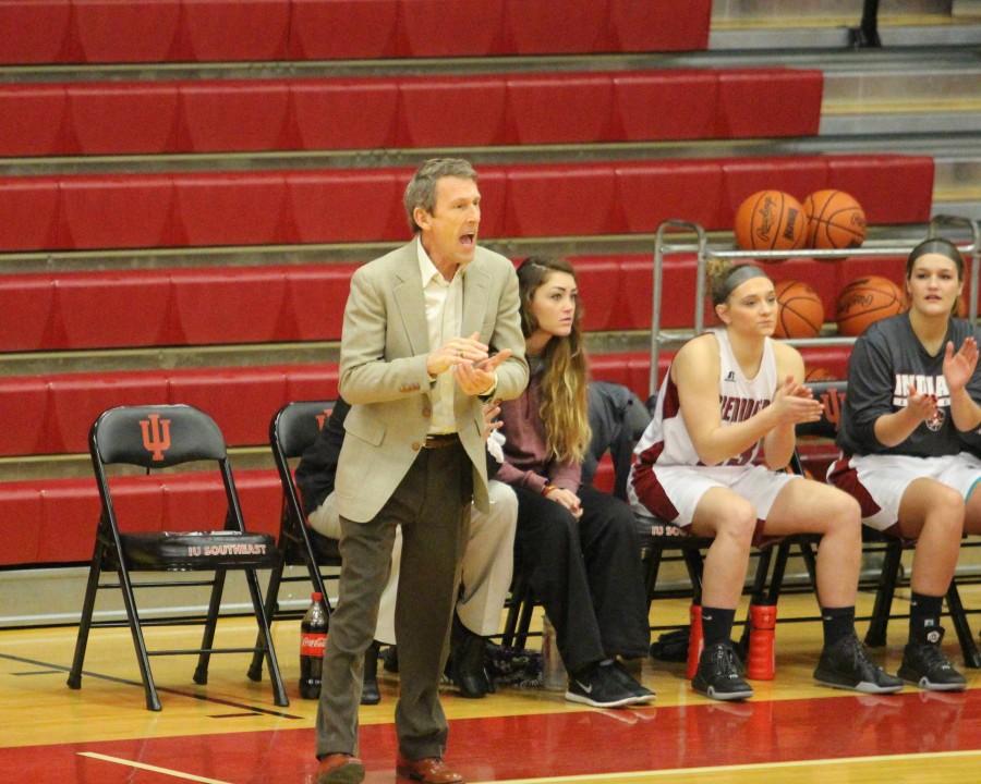 Head coach Robin Farris instructs his team late in the fourth quarter. The Grenadiers lose in overtime by one, 96-97.