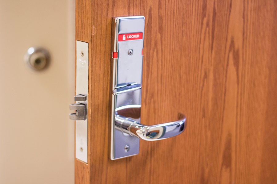 The door of Knobview Hall, room 207, is one of many doors in Knobview that have had new thumb locks installed.