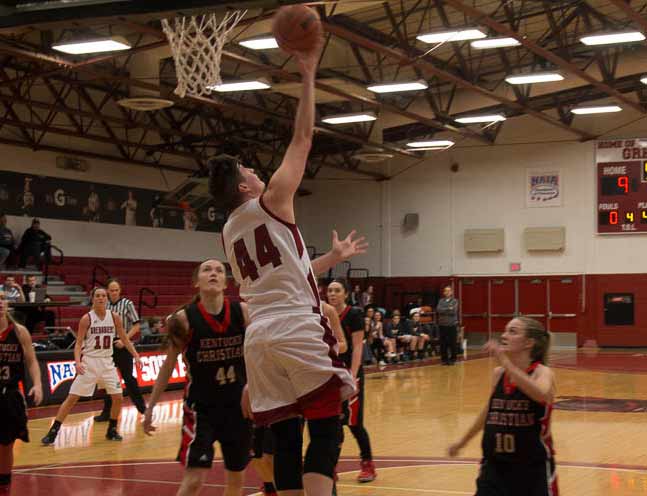 Junior forward Jocelyn Mousty lays up the ball early in the game. She finished with 18 points and 12 rebounds. 