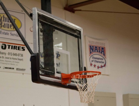 The IUS men's senior day basketball game was cancelled because of the rim being bent. slightly to the left.
