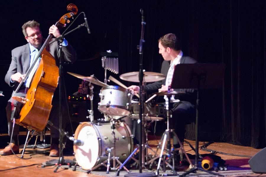 Bass player Scott Pareza and drummer Mitch Shiner playing their instruments during Mood 10 of the Langston Hughes Project concert