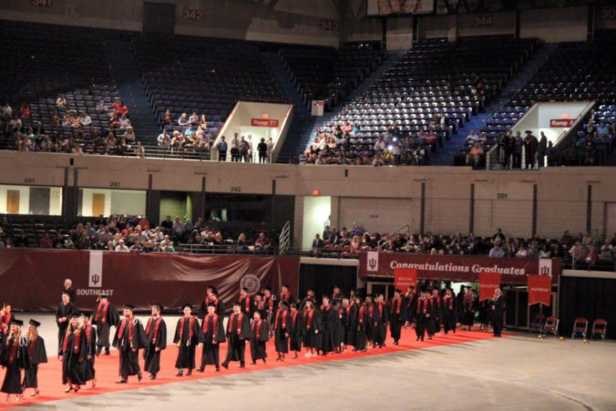 Graduating seniors prepare to take their seats in the Freedom Hall arena for the IUS Commencement ceremony on Monday, May 9.