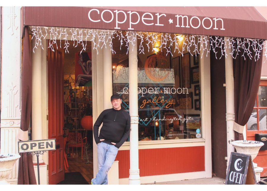 Eli Ivey, new owner of Copper Moon Gallery in downtown New Albany, stands in front of his new gallery. Ivey loves the the gallery’s location due to it’s close proximity to downtown Louisville.