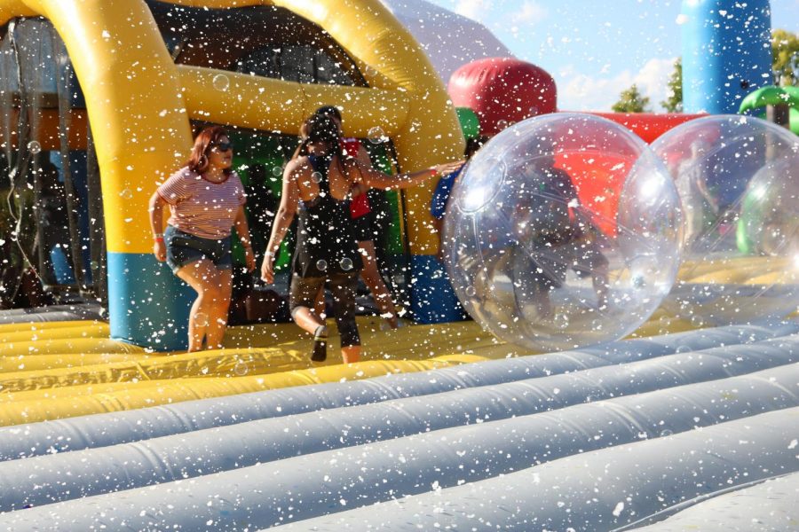 A bubble machine shoots out bubbles onto the jumpers. Photo by Meleena Richardson