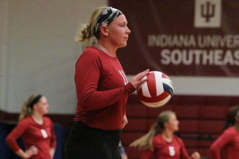 Monica Loftus, senior outside hitter, prepares for a serve against Lindsey Wilson College.