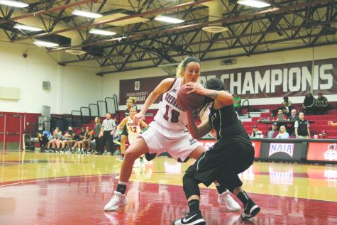 Senior forward Josie Hockman applies pressure on a press in last season's 68-46 loss to Roosevelt University. Hockman finished the game with 10 points and four rebounds.
