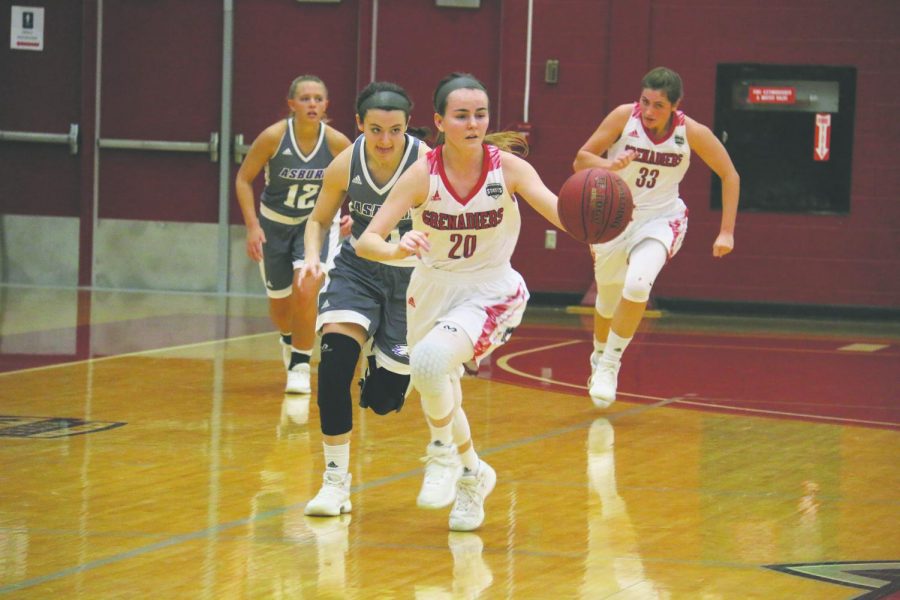 Junior guard Madi Woods drives the ball up the court in an 81-79 home loss to Asbury University last season. Woods is one of the key returning players for Farris 30th season at the helm of the Grenadiers womens basketball team. Photo by Tamar Kelly.