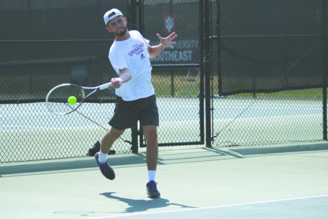 IU Southeast men’s tennis junior, Garrett Fensler, swings through a forehanded return in a Spring 2018 match. Fensler earned all-conference honors for his second consecutive season in 2017-18.