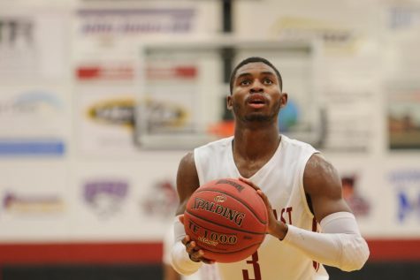 Senior guard Jamie Johnson attempts a free throw in the Grenadiers' 114-64 Homecoming rout of Miami-Middletown.