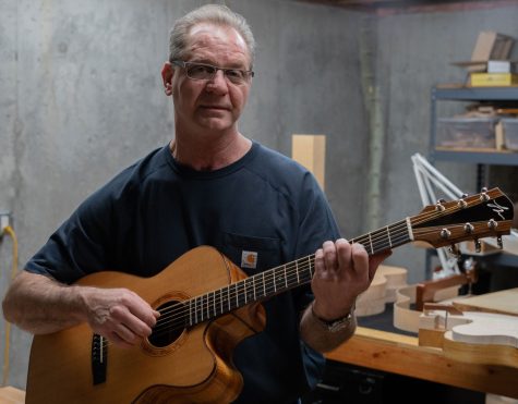 Mabe holds up the first guitar he made. “I still play that guitar almost every week, and it’s not the most comfortable guitar that I play, but I play it because I appreciate it, I appreciate the sound.”