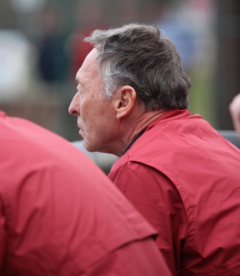 IUS Bench Coach Dave Collins looks on from the dugout during the Grenadiers home opener against Georgetown College on February 3, 2020.