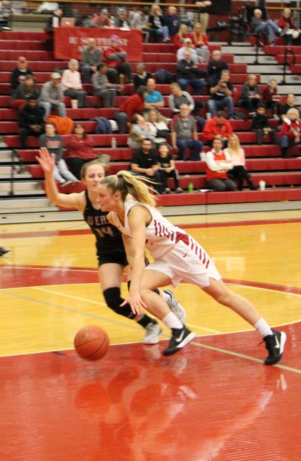 IUS sophomore Lauren Lambdin tries to drive past IU East’s Addie Brown during the second half of the Grenadiers’ RSC Quarterfinal victory over the Red Wolves.