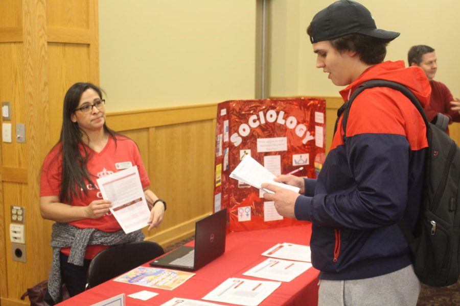 Veronica Medina (left), associate professor of sociology, takes questions from Blake Masters, who is currently undecided on a major.
