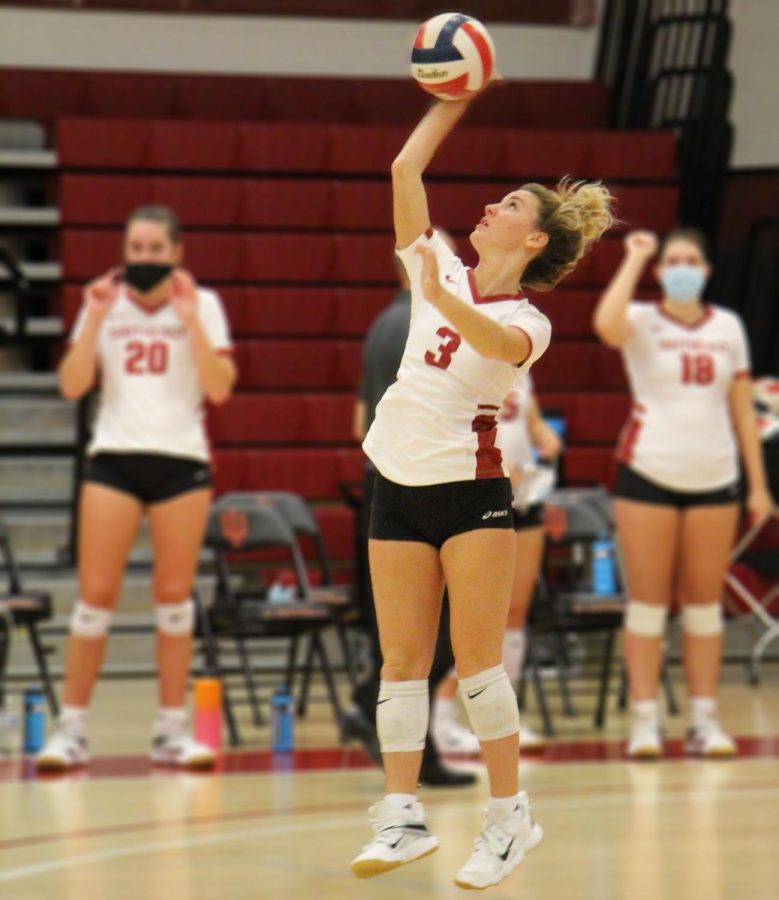 Sophomore Defensive Specialist Santina Schembra prepares to launch the ball midserve during a Grenadier home match against Brescia on Oct. 24, 2020.