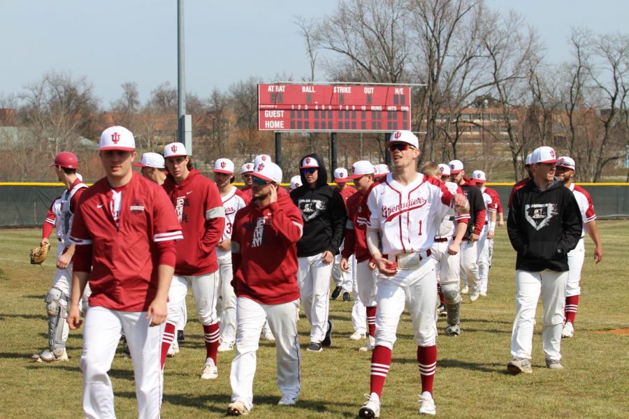 The IUS Baseball team returns to the dugout upon completing throwing practice prior to a contest against West Virginia Tech on March 1, 2020. 