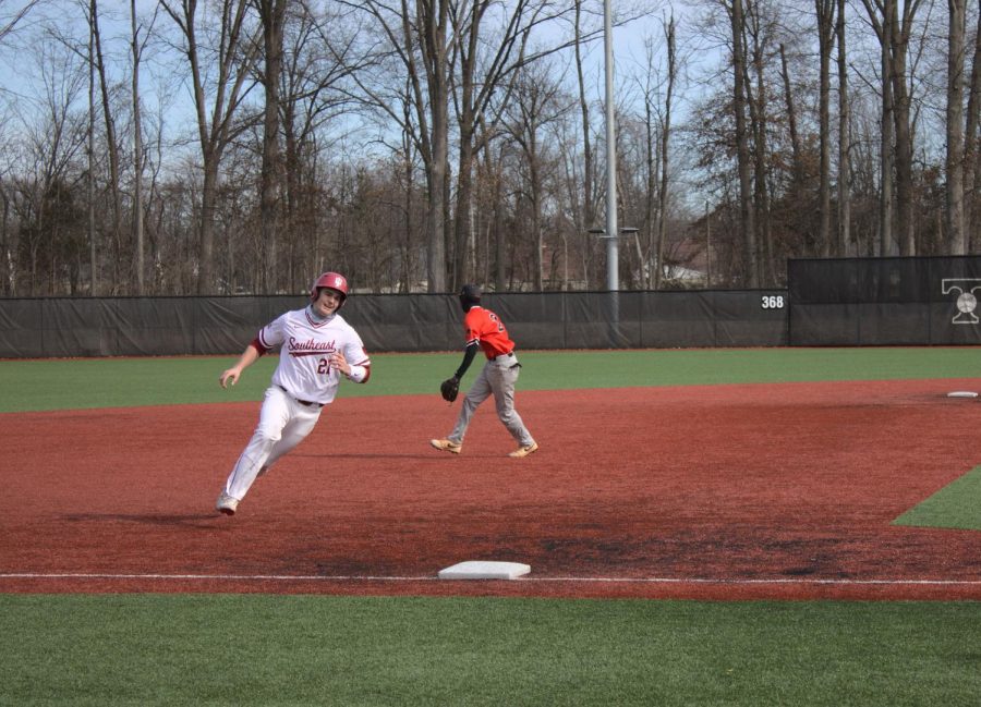 Senior+Matt+Monahan+rounds+third+base+before+scoring+as+a+result+of+Jake+Scotts+two-run+single+in+the+first+game+of+a+doubleheader+against+Pikeville+on+Feb.+6.