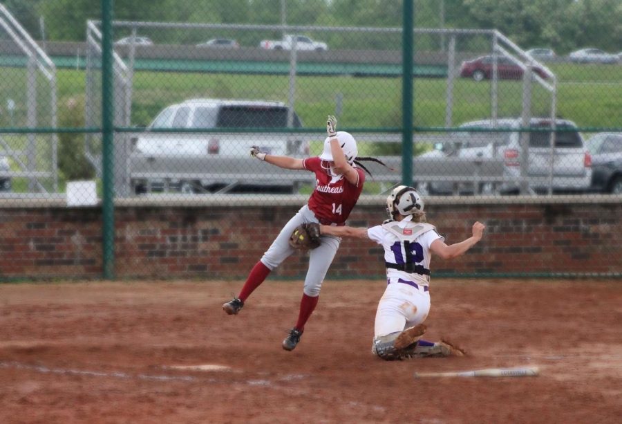 Freshman outfielder Brooklyn Gibbs gets tagged at home plate after a perfect throw from Carlow centerfielder Morgan Nedley, preventing the Grenadiers from scoring in the second inning of the nightcap of a doubleheader against the Celtics on May 3.