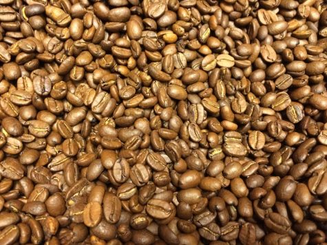 Roasted coffee beans by AndreasPoike is licensed under CC BY 2.0.