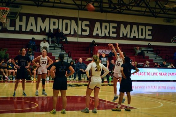 IU Southeast’s #33 Ella Brown shoots a free throw as teammates #23 Morgan Roberts and #25 Linzie Wernert line up along the lane during the Grenadiers’ game against Midway University (KY) on Feb. 25, 2026, at IU Southeast.