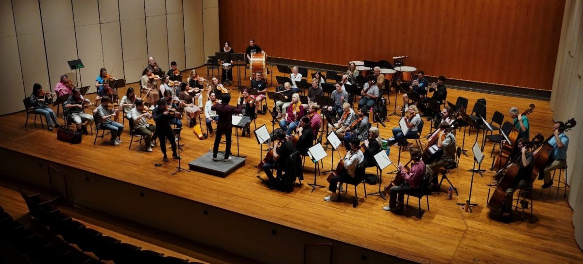 The Louisville Orchestra rigorously prepares for the show during an afternoon rehearsal.