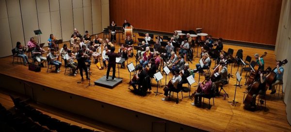 The Louisville Orchestra rigorously prepares for the show during an afternoon rehearsal.