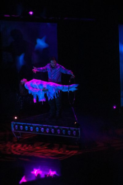 David Caserta, master magicians, makes his assistant float above the stage. 